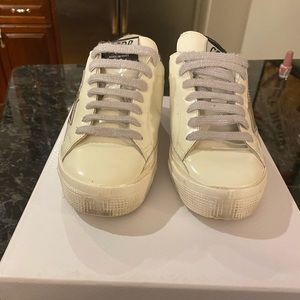 Golden Goose sneakers gold white and black used
